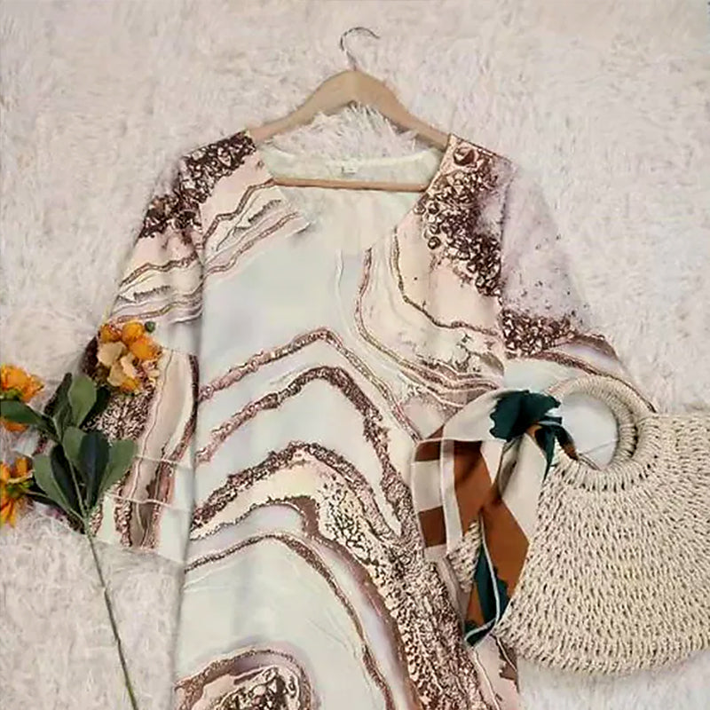 Zomerjurk met klokmouwen