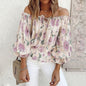 Blouse met ruches aan de mouwen en bloemen